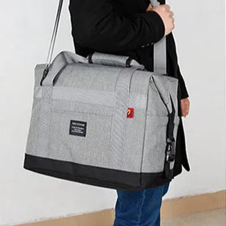 grand sac isotherme porté à l'épaule